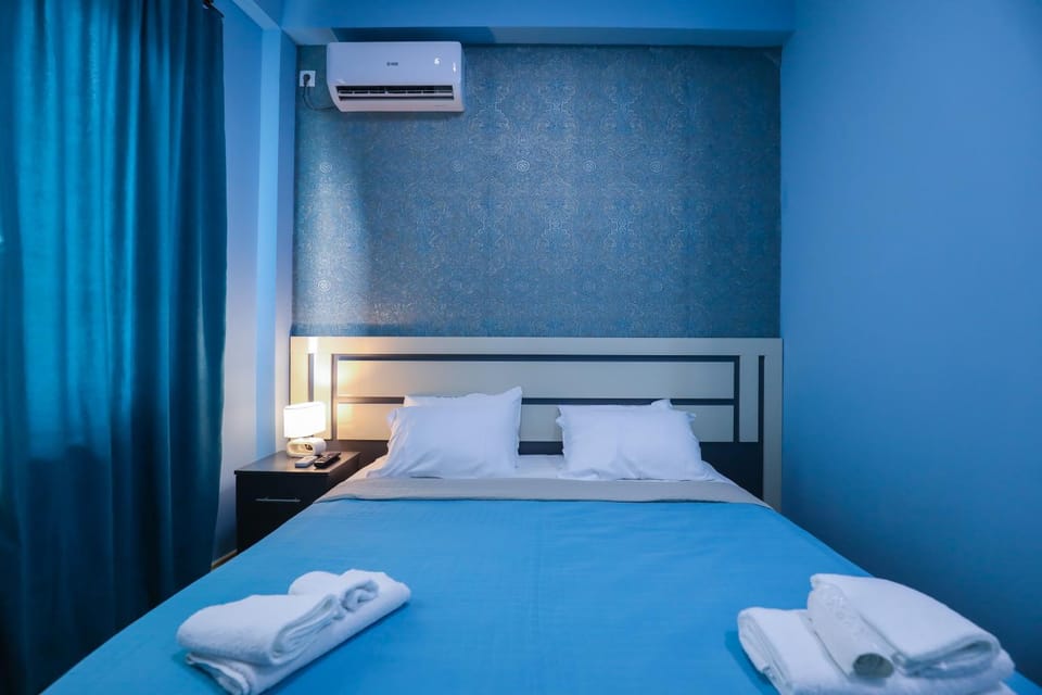 Bed, Bedroom, towels, air conditioner