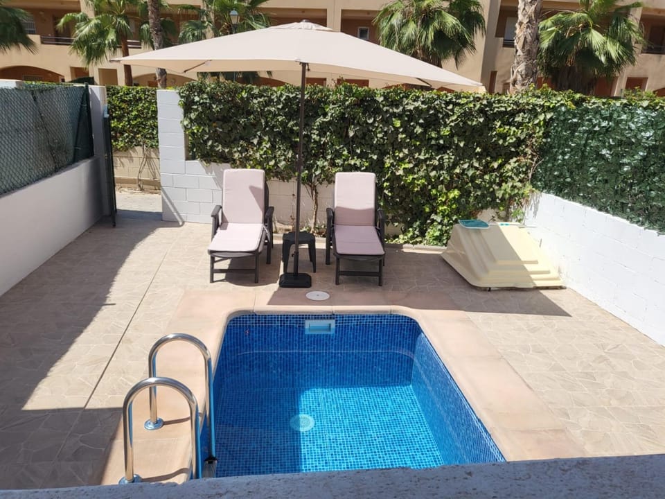 Patio, Day, Pool view, Swimming pool, sunbed