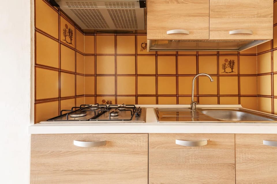 Kitchen or kitchenette, stove