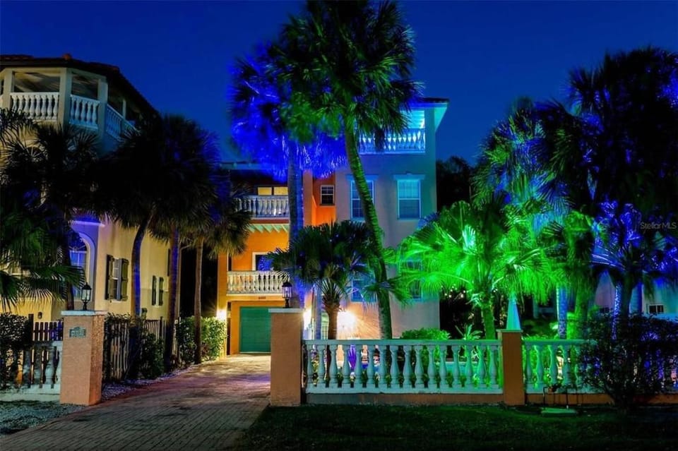 Tropical luxury pool home by the beach with roof top lounge centrally located on Anna Maria Island House in Holmes Beach