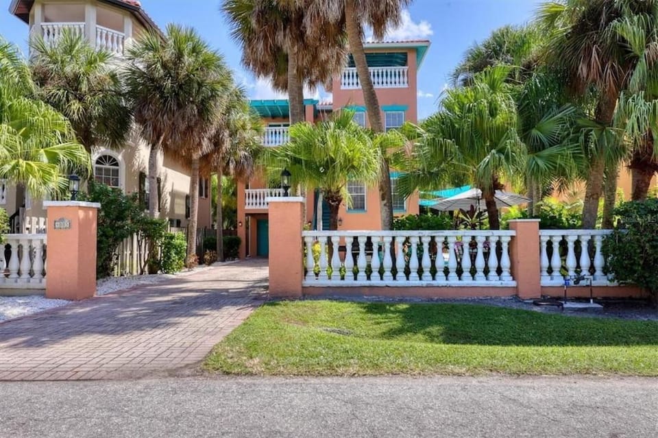 Tropical luxury pool home by the beach with roof top lounge centrally located on Anna Maria Island House in Holmes Beach