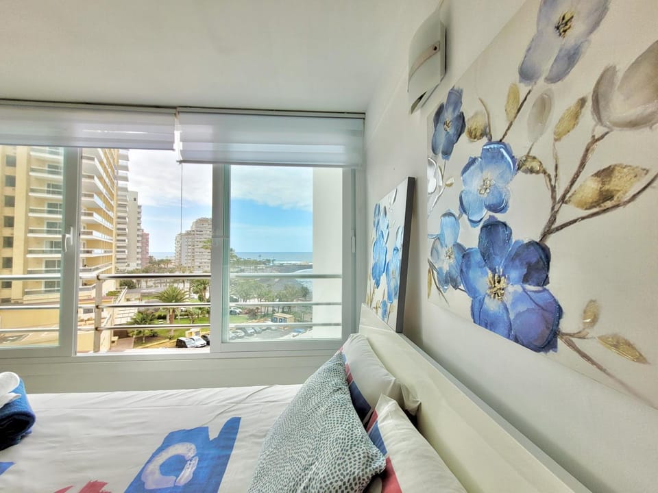 Bed, View (from property/room), Bedroom, City view, Landmark view, Pool view, Sea view