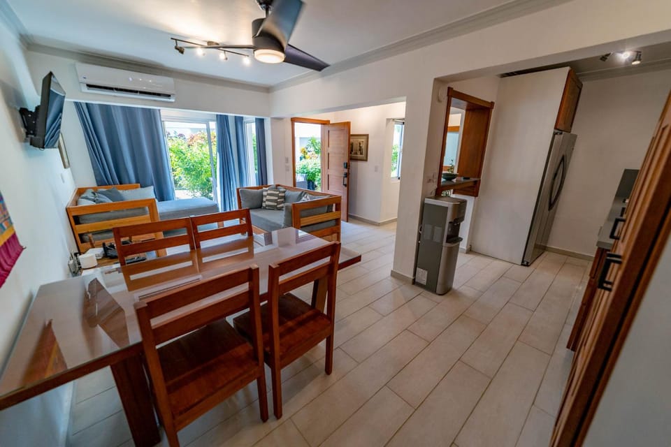 TV and multimedia, Kitchen or kitchenette, Living room, Photo of the whole room, Seating area, Dining area