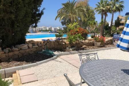 Patio, Dining area, Pool view