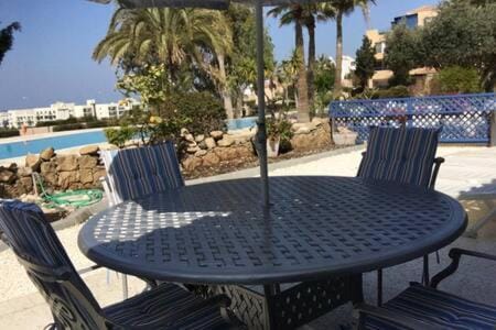 Balcony/Terrace, Seating area, Dining area, Pool view