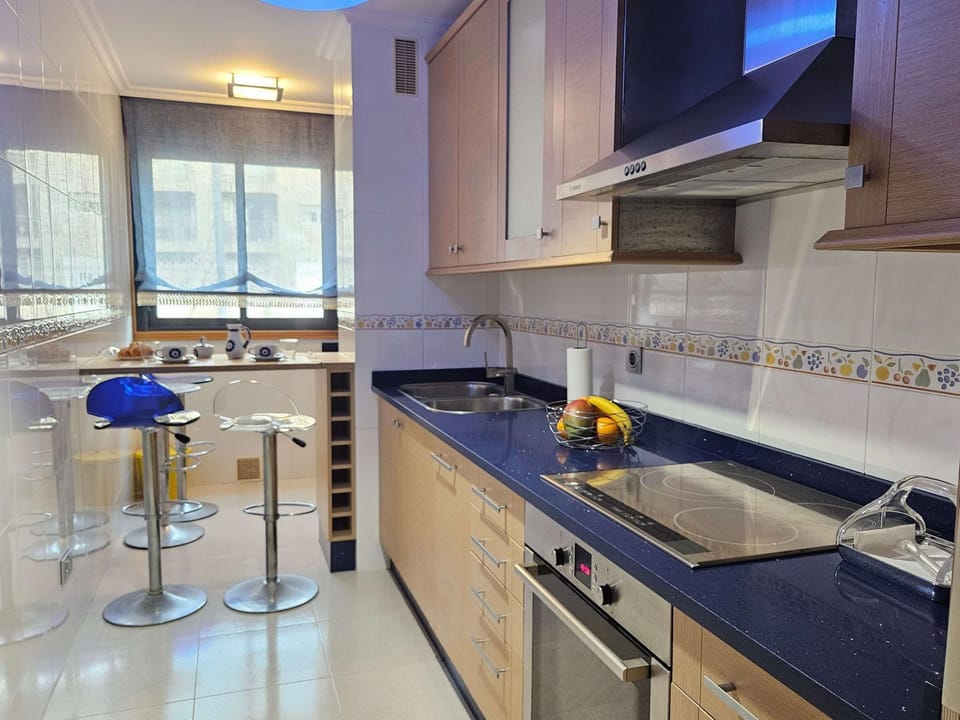 Kitchen or kitchenette, dishwasher, stove