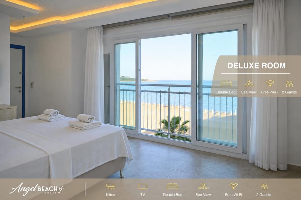 Photo of the whole room, Bedroom, Sea view, towels