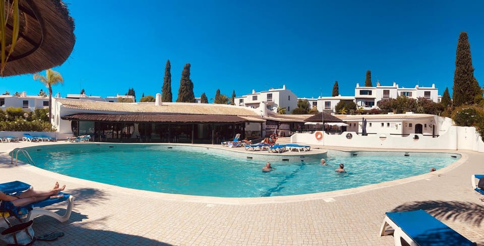 Swimming pool, sunbed