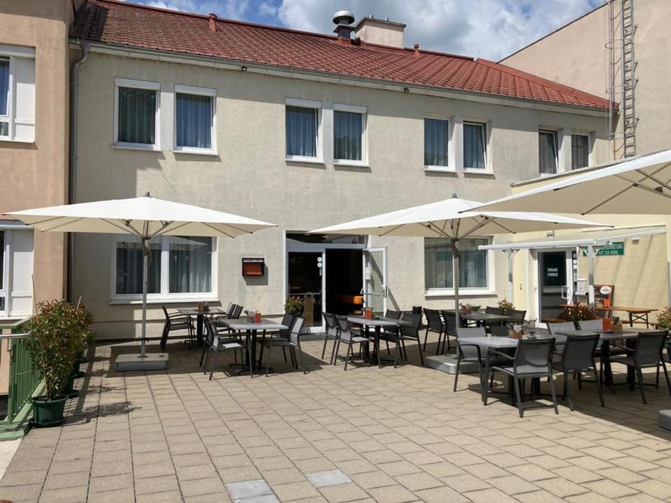 Property building, Restaurant/places to eat, Balcony/Terrace, Balcony/Terrace, Banquet/Function facilities