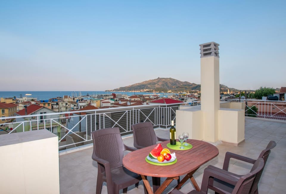 Patio, Day, View (from property/room), Balcony/Terrace, Dining area, Mountain view, Sea view