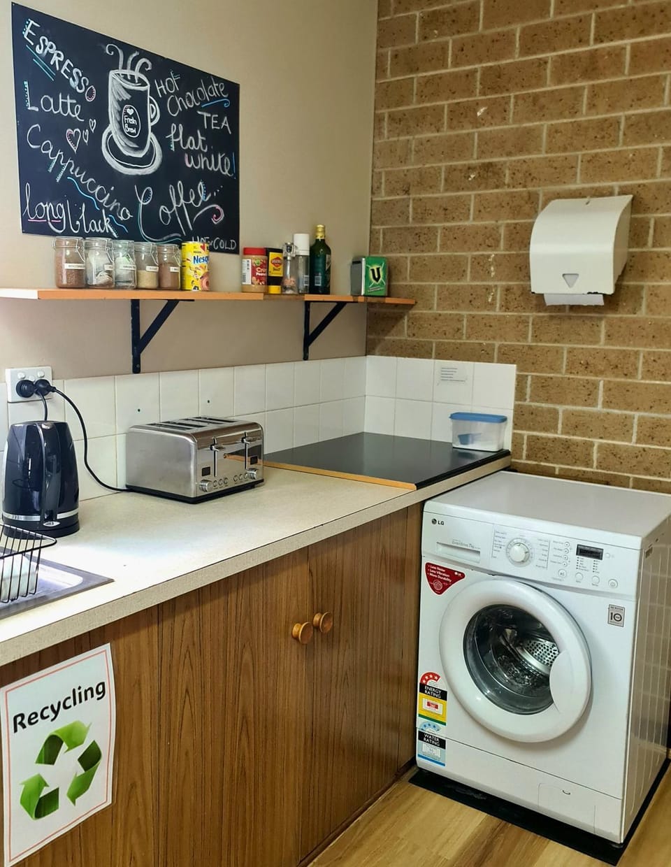 Kitchen or kitchenette, toaster, washing machine