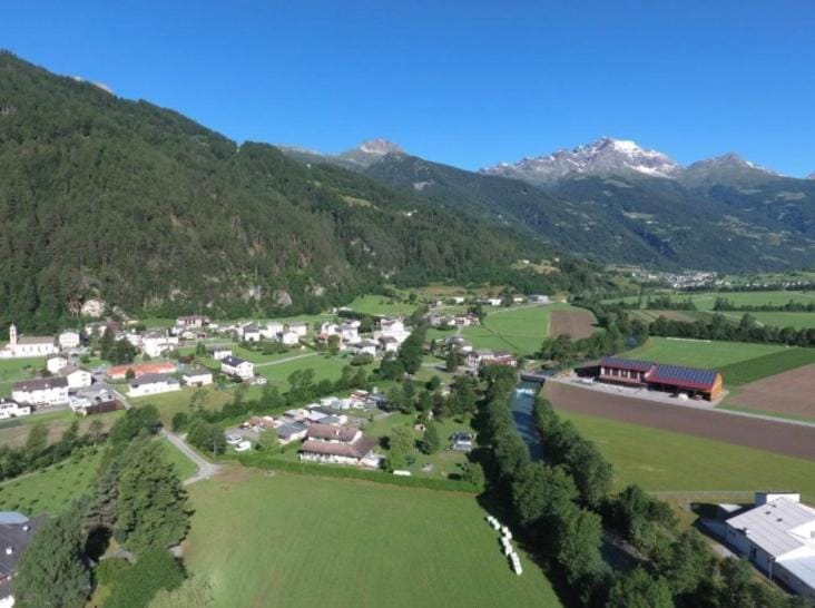 Bungalow Miralago in Camping Cavresc, Via dal Cavresc 1, 7746 Le Prese-Poschiavo House in Province of Brescia
