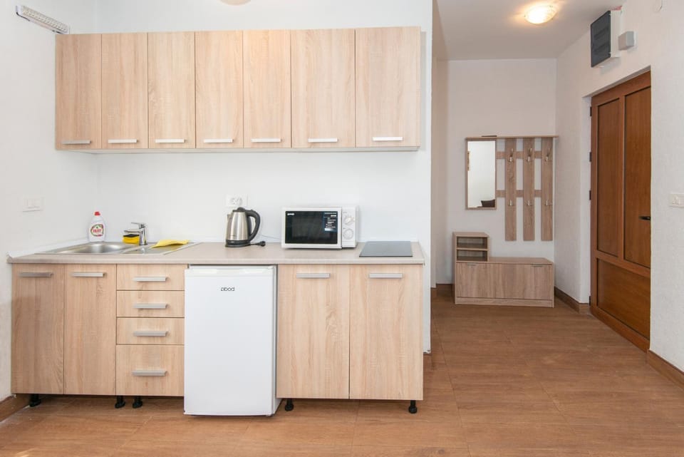 Kitchen or kitchenette, stove