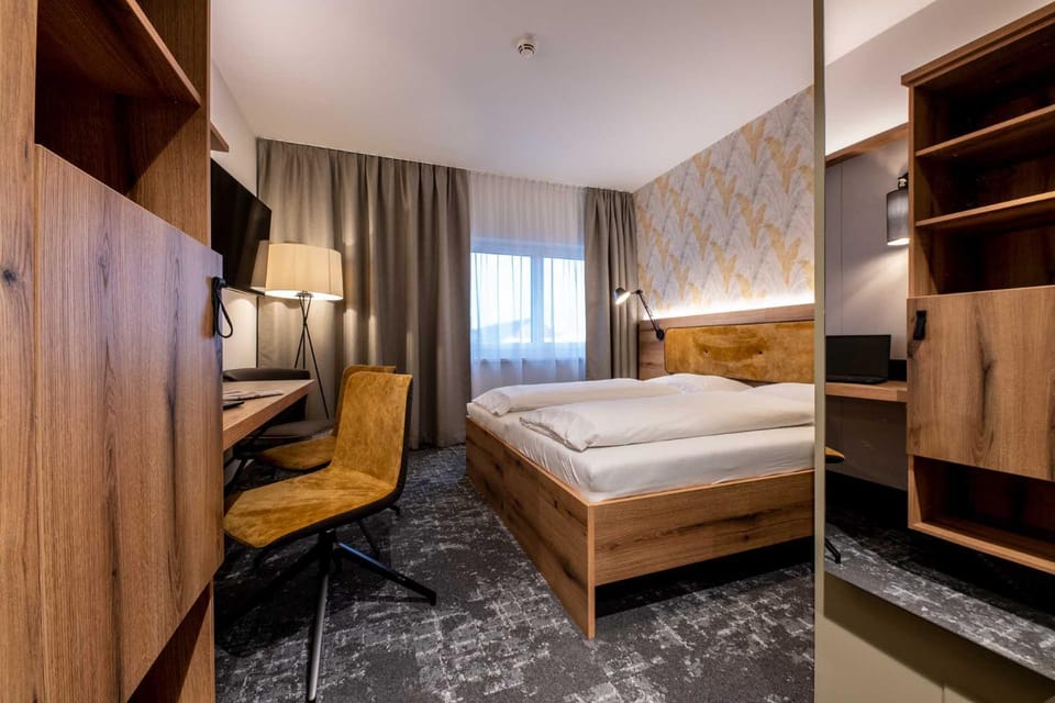 Bed, Living room, Seating area, Bedroom