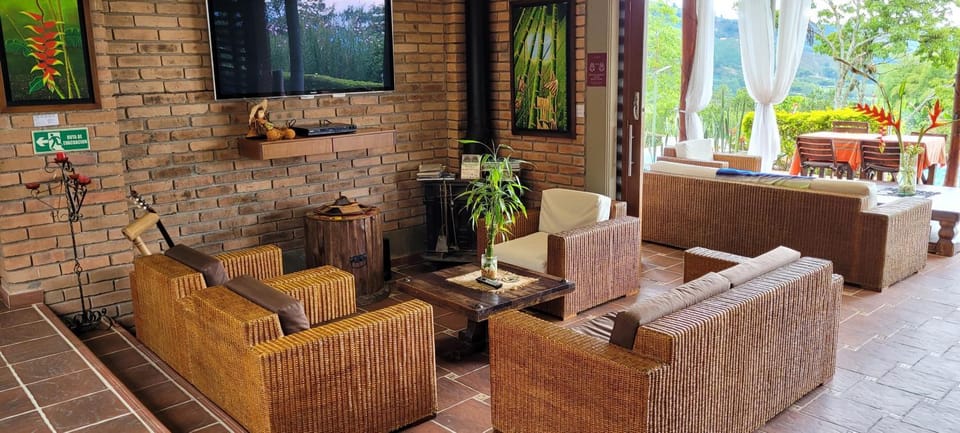 Communal lounge/ TV room, Living room, Seating area, Garden view
