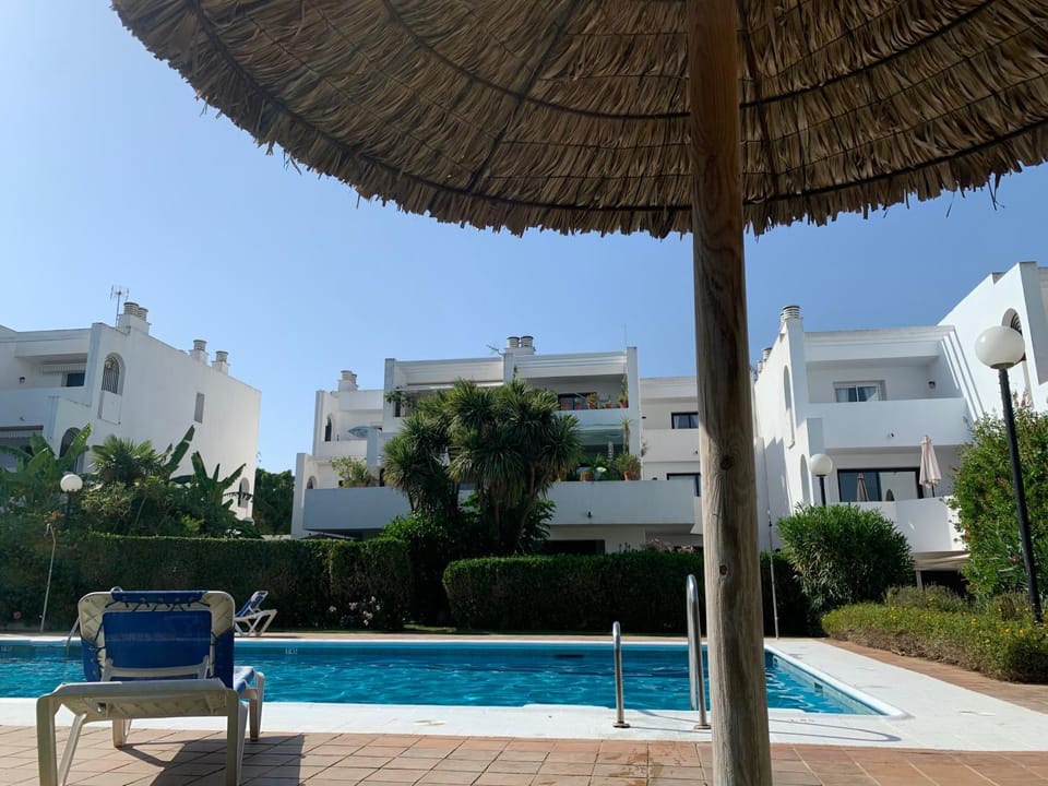 Property building, Patio, Day, Pool view, Swimming pool, sunbed