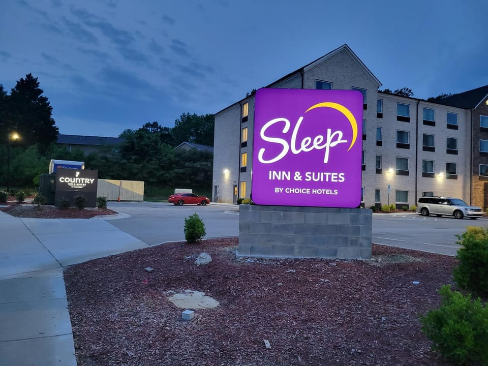 Property building, Night, Property logo or sign, Parking