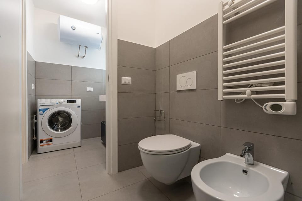 Bathroom, bidet, washing machine