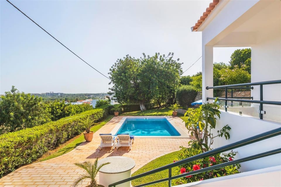 Property building, Living room, Swimming pool