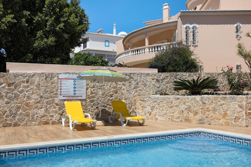 Property building, Living room, Swimming pool