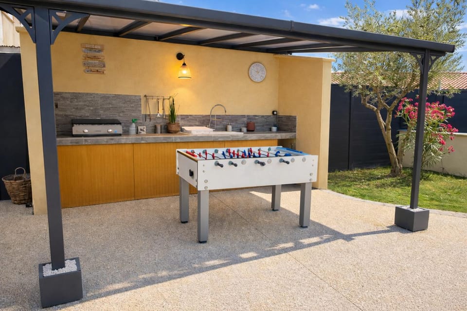 Sublime villa des Oliviers - Piscine chauffée, espace détente, Baby-foot, cuisine extérieure - proche d'Agen Villa in Nouvelle-Aquitaine