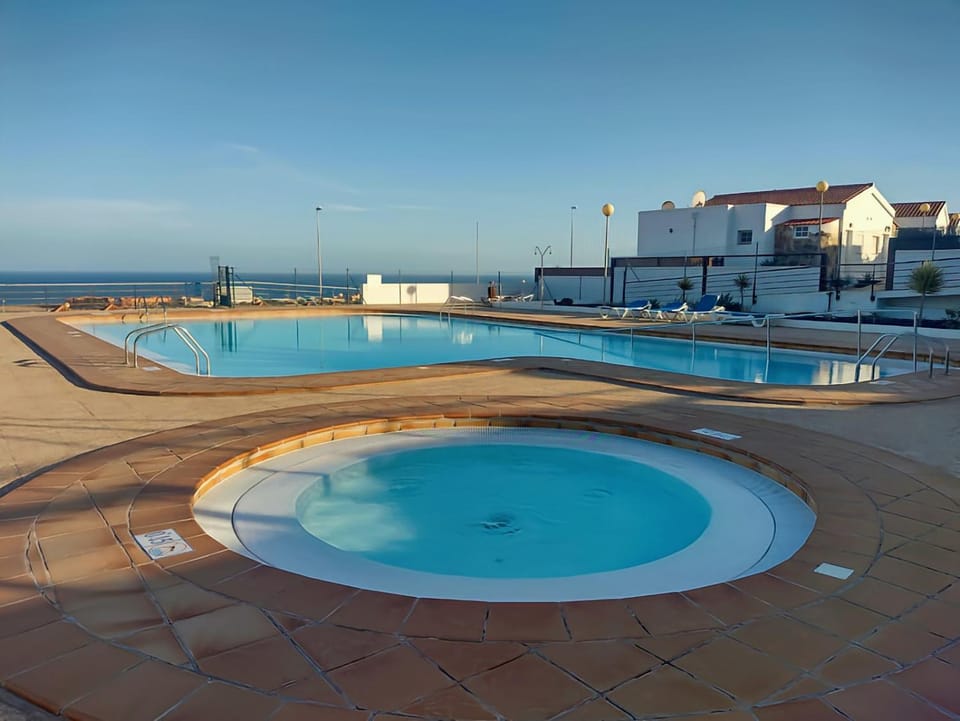 Property building, Day, Natural landscape, Sea view, Swimming pool, sunbed