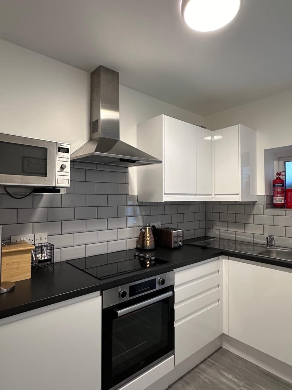 Kitchen or kitchenette, stove, toaster, kitchen