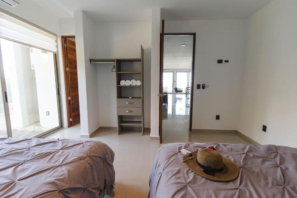 Angelina 28 Beachfront and Family Apartments - Modern and Relaxing Long Stays - 20 min from Cancun Airport Apartment in State of Quintana Roo