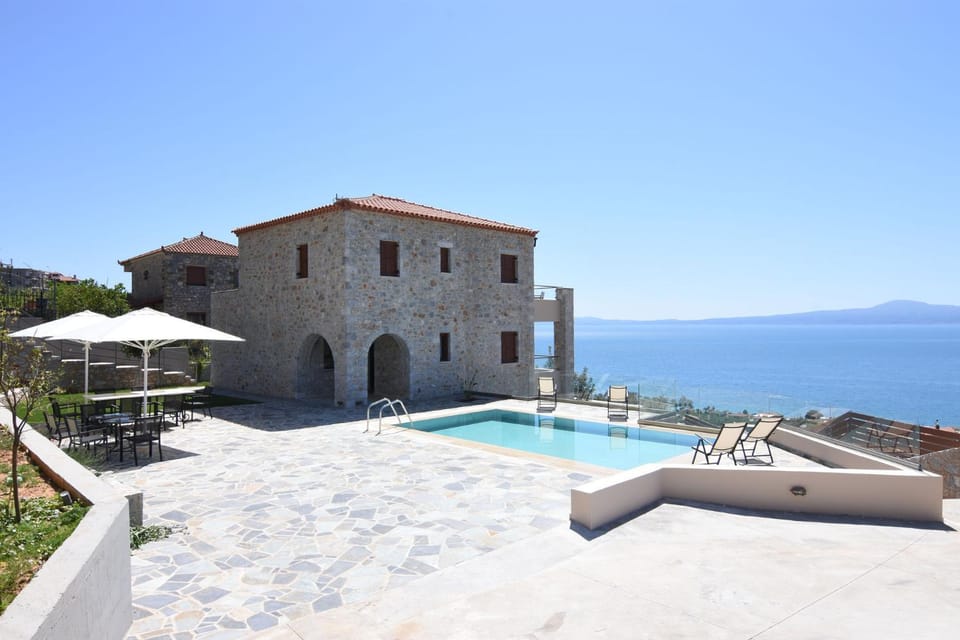 Property building, Day, Natural landscape, Pool view, Sea view, Swimming pool, sunbed