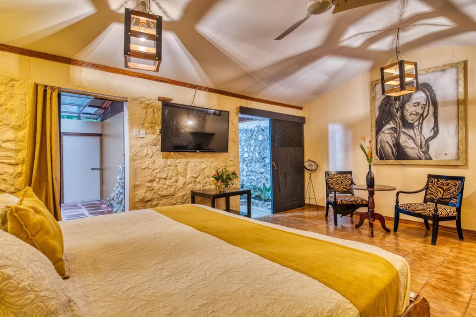 Bed, Living room, Seating area, Bedroom