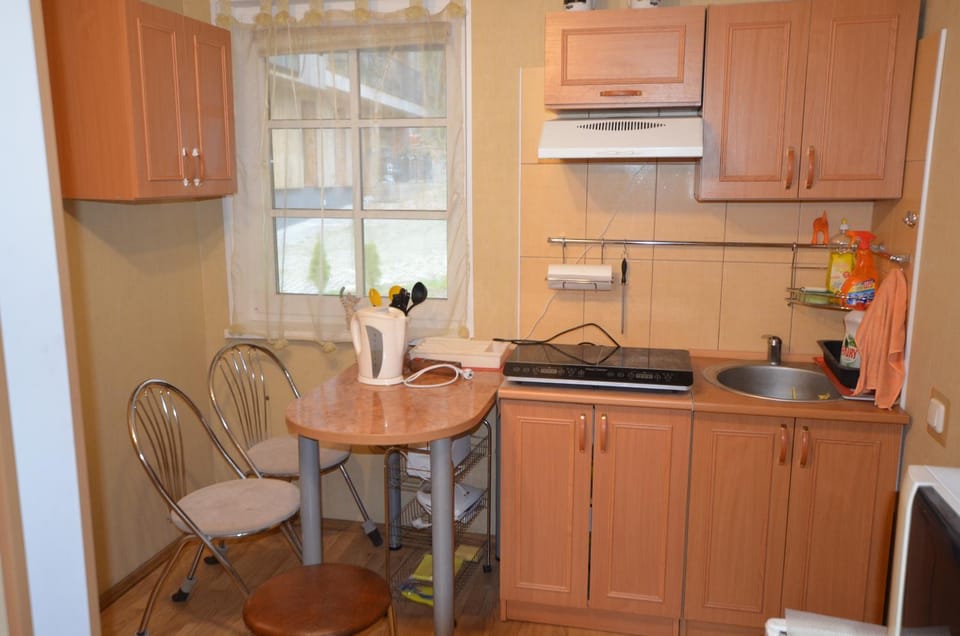 Butas su sodu Juodkrantėje Ievos kalno papėdėje Apartment in Klaipėda County, Lithuania
