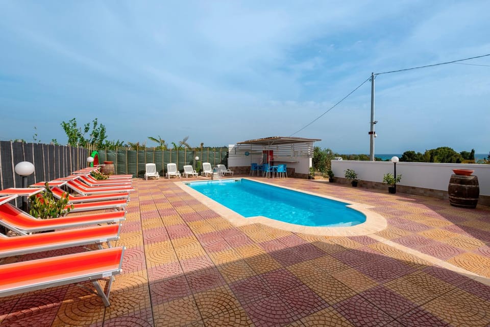 Property building, Living room, Swimming pool