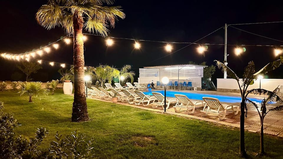 Property building, Living room, Swimming pool