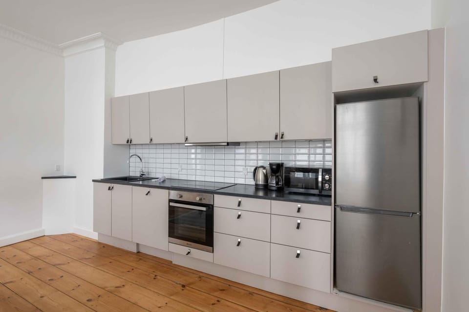 Kitchen or kitchenette, oven, stove