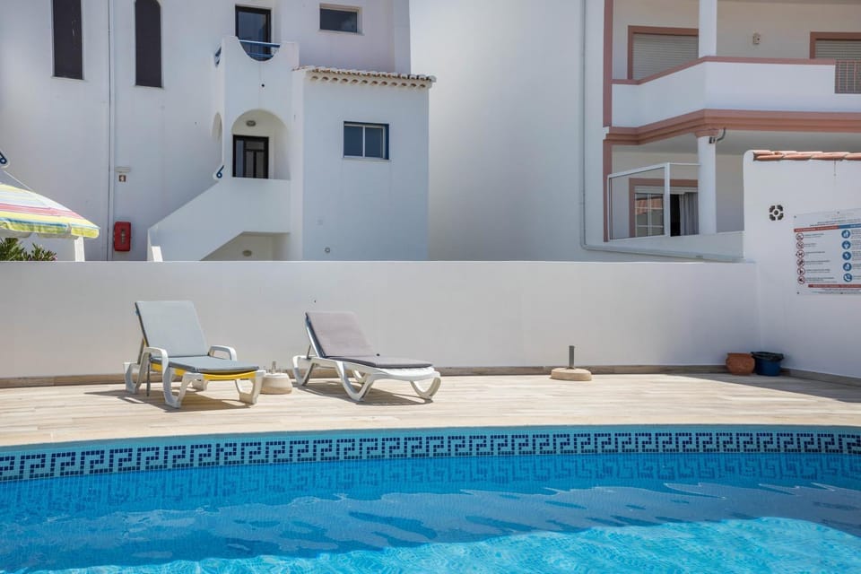 Property building, Living room, Swimming pool