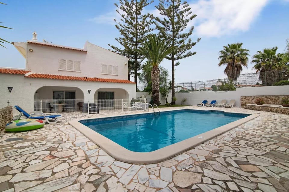 Property building, Living room, Swimming pool