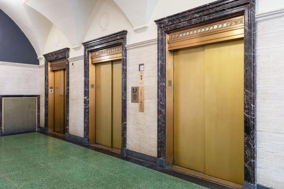 Property building, elevator