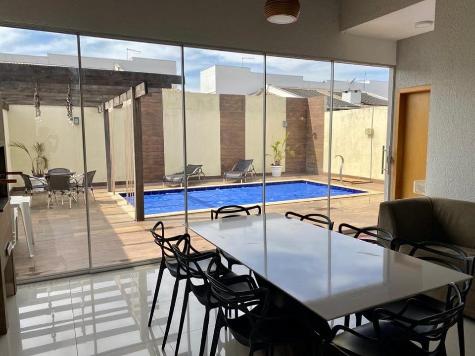 Kitchen or kitchenette, Dining area, Pool view