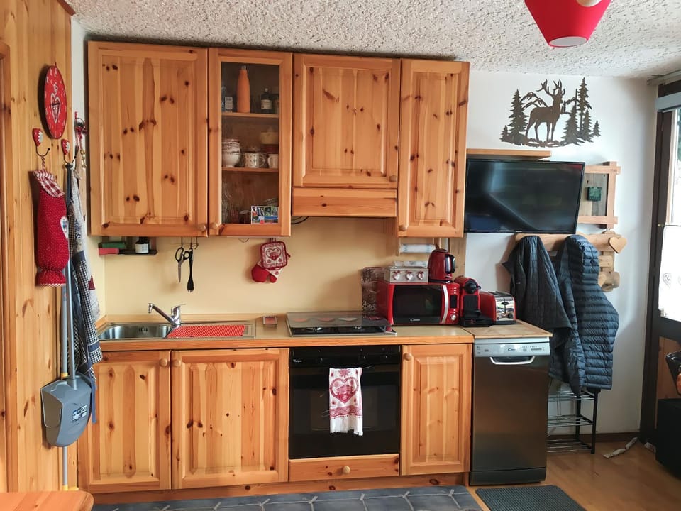 Kitchen or kitchenette, stove