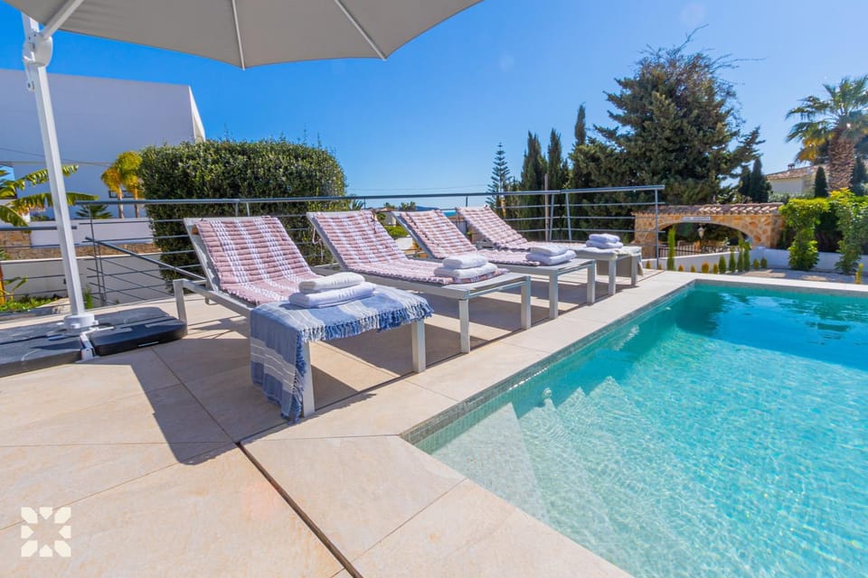Patio, Day, Natural landscape, Pool view, Swimming pool, sunbed