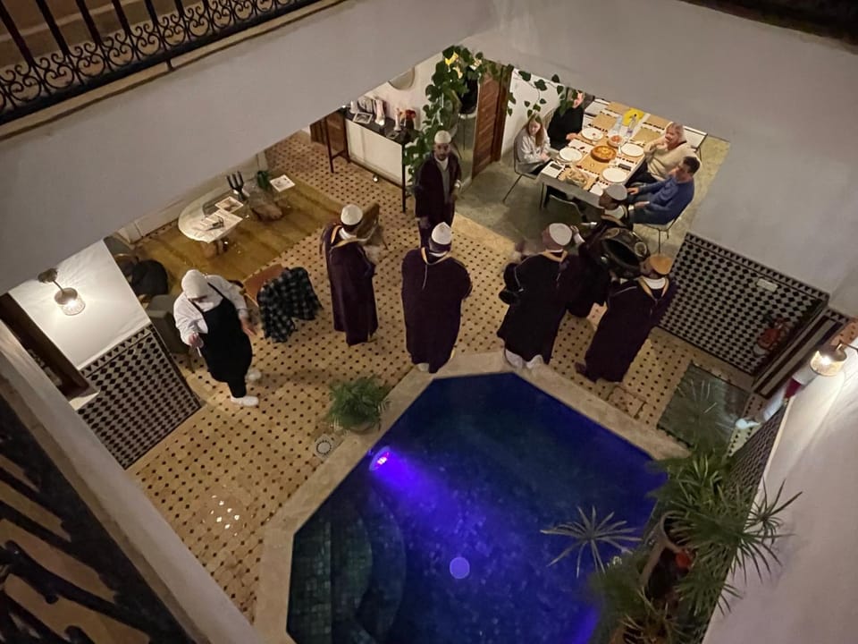 Restaurant/places to eat, Night, People, Activities, Seating area, On site, Food, Pool view, Swimming pool, Meals, Meals, group of guests