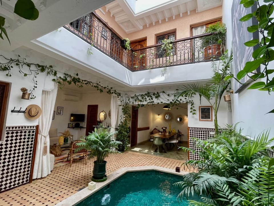 Property building, Patio, Day, Pool view, Swimming pool