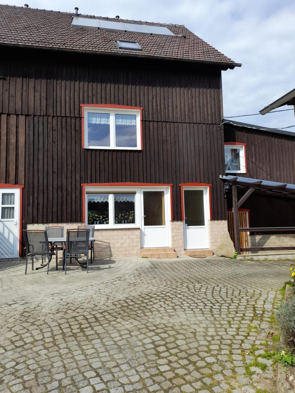 Property building, BBQ facilities, Seating area
