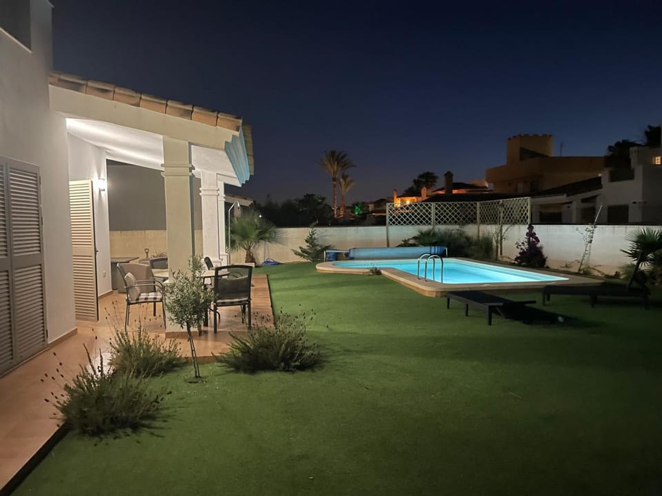 Night, Pool view, Swimming pool, sunbed