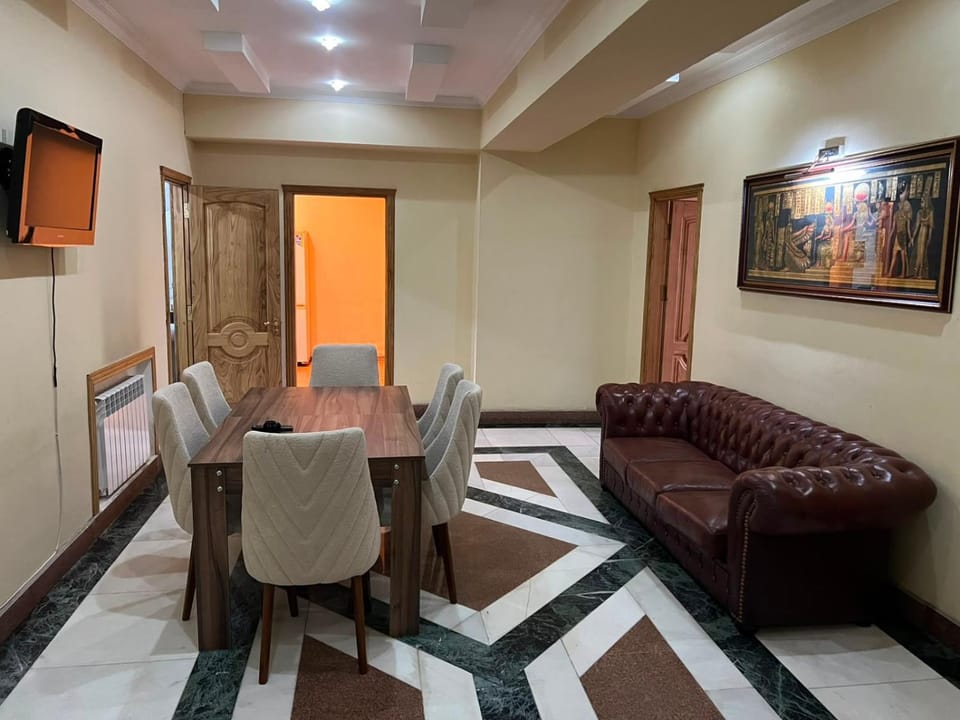 Communal lounge/ TV room, TV and multimedia, Living room, Seating area, Dining area
