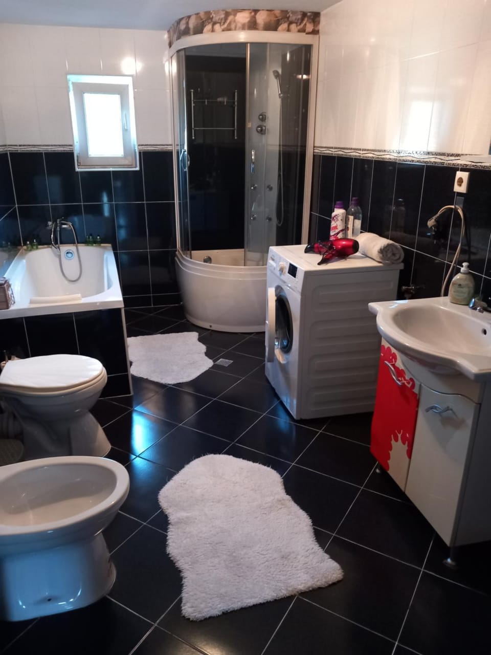 Shower, Toilet, Bathroom, Bath, bidet, towels, washing machine, dryer