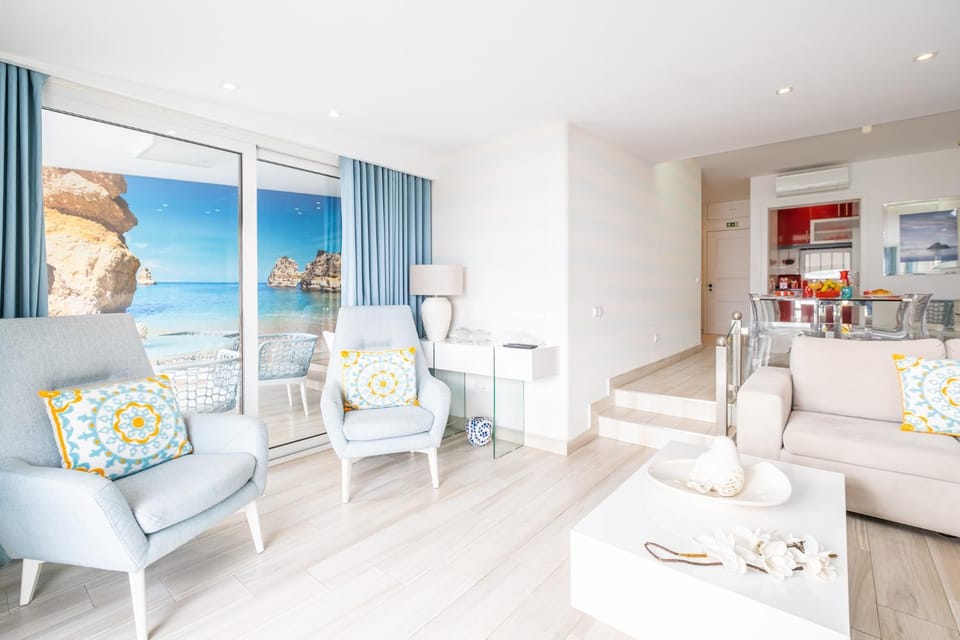 Natural landscape, Living room, Seating area, Dining area, Sea view