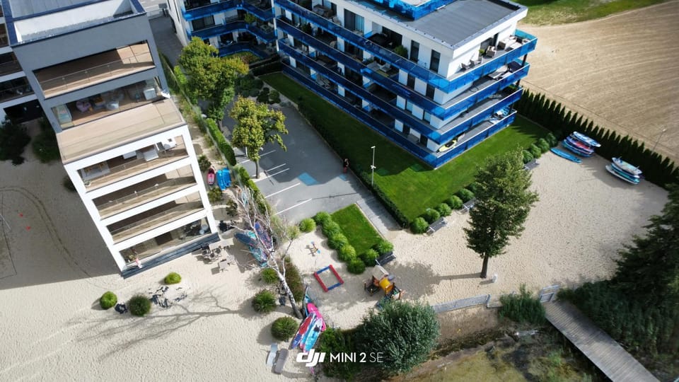 Property building, Day, Natural landscape, Bird's eye view, Children play ground, Beach, Location