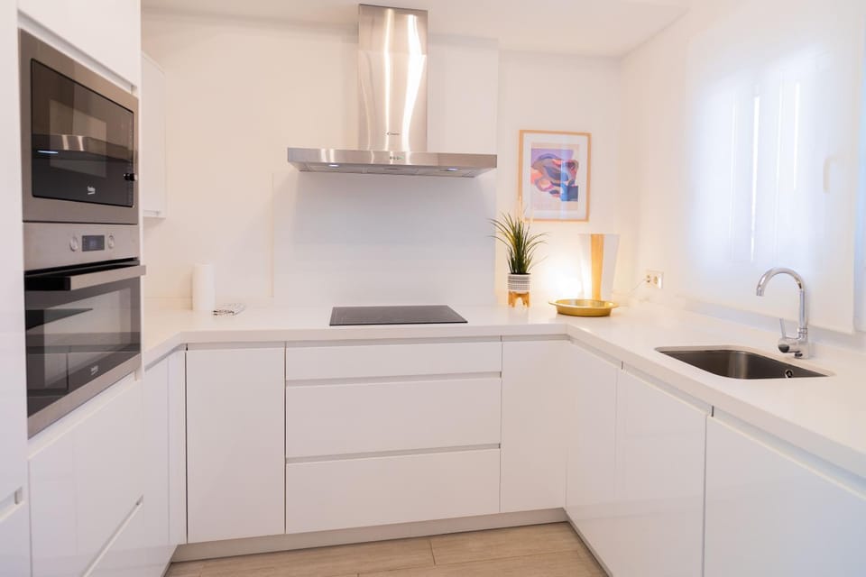 Kitchen or kitchenette, dishwasher, microwave, stove
