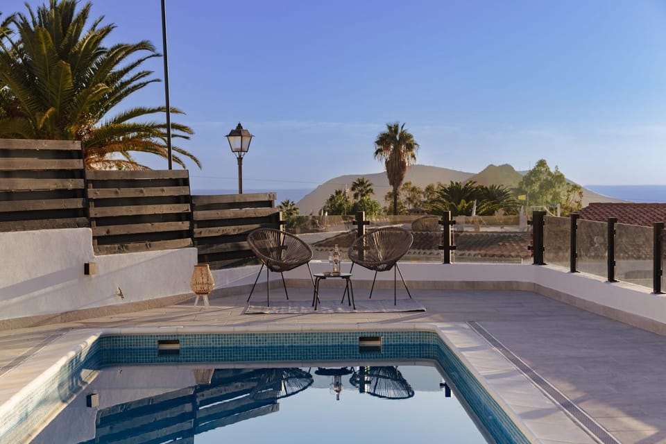 Property building, Living room, Swimming pool